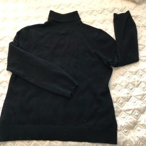 Black cashmere turtleneck sweater